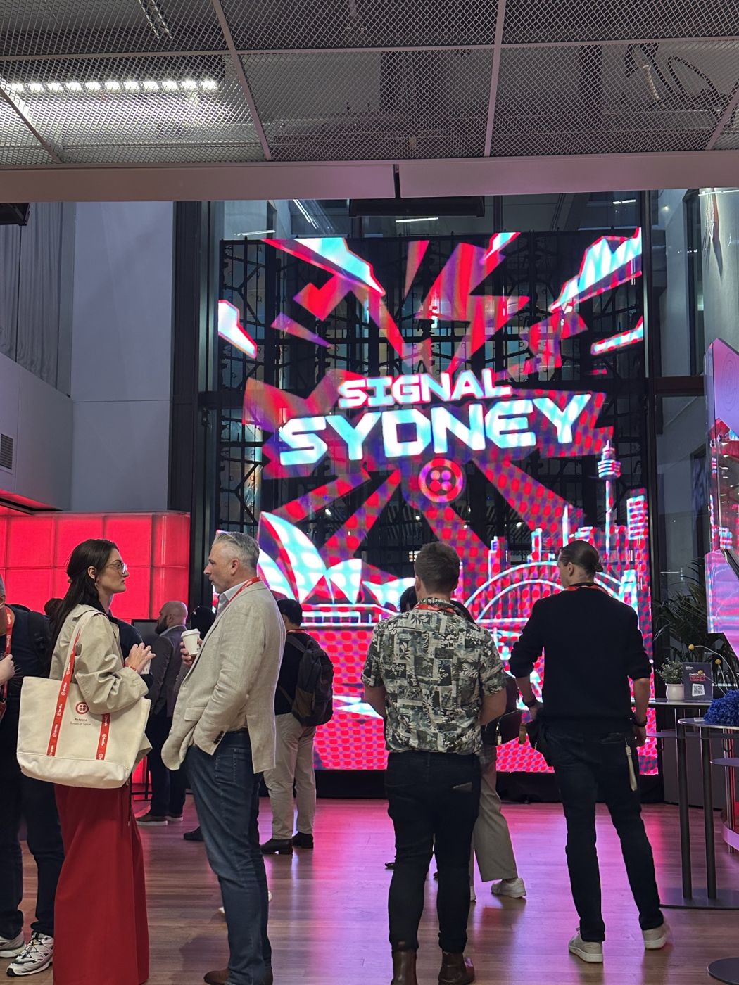 The SIGNAL Sydney screen in the foyer at ILUMINA, Sydney