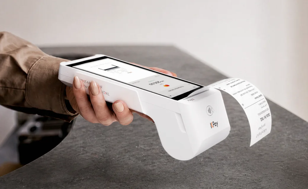 A KPay Terminal Pro printing a receipt
